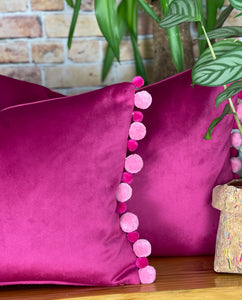 Pink pom pom sales cushions
